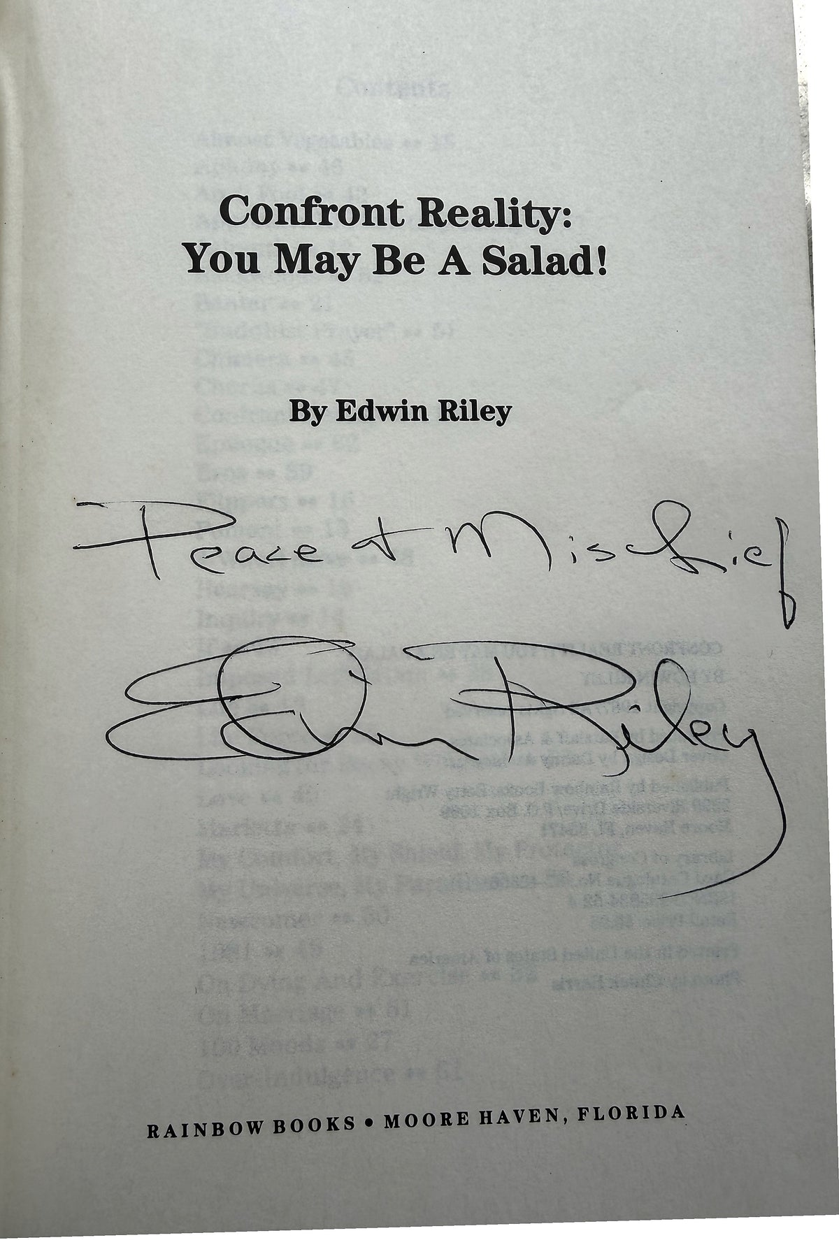 Example title page signed by Edwin Riley